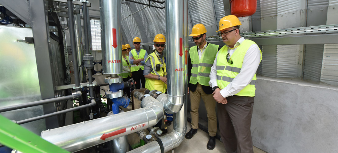 On location in Poeni, Romania, Sven Buehler and Kurt Vielhaber inspecting the newly installed energy solution.